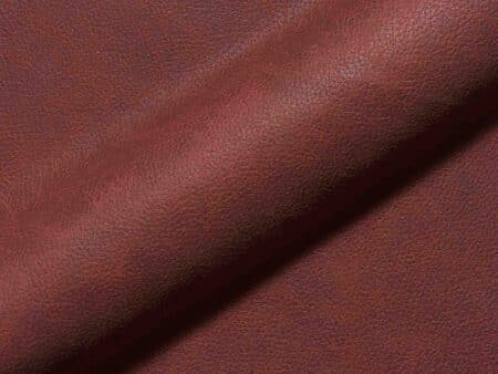 Polsterstoff Sella 1407 mit ruhigem Lederlook, geschmeidiger Oberfläche und robuster Qualität, pflegeleicht und ideal für moderne Polstermöbel.
